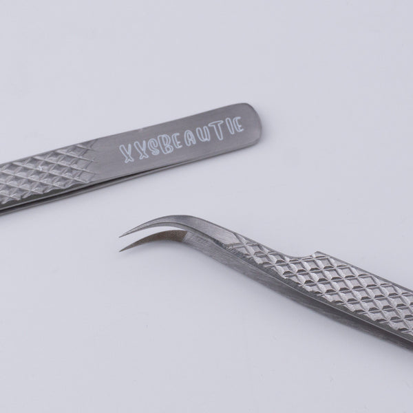 Fiber Tip Volume Tweezer